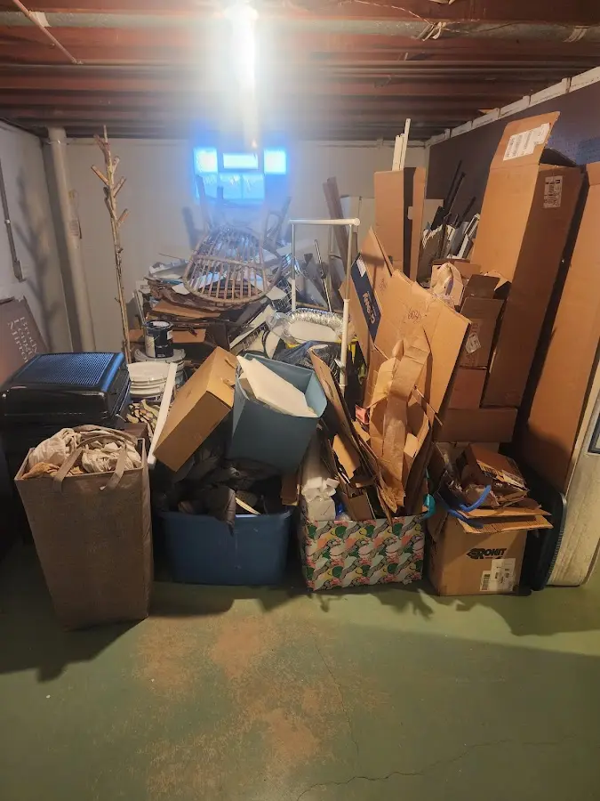 Roll-off dumpster container at job site for Yard Waste Dumpster Rental in Lenoir